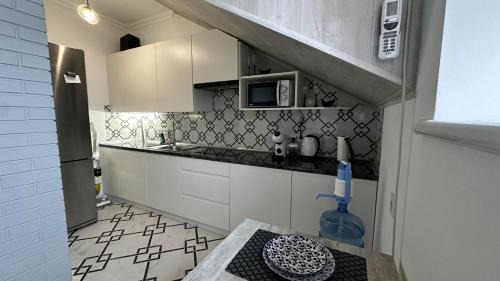 Kamenets-Podol'skiy Apartment | Апартаменти - Історія з вікна