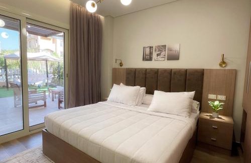 Sheikh Zayed City Apartment | شقة فاخرة 3 غرف نوم و حديقة خاصة في الشيخ زايد - Zayed Suites A