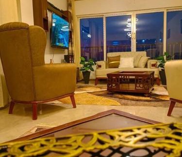 Giza Apartment | شقة فندقية ترى النيل والاهرامات 1