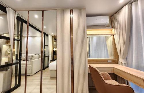 Khlong Toei Nuea Apartment | คอนโดสุขุมวิทสวีท เรียบหรู อบอุ่น ครบครัน