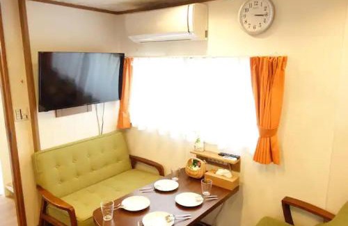 Makishi Apartment | 大家族向け貸切宿 敷地内無料駐車場 最高のロケーション 各階独立鍵付き個室 Paradise inn牧志