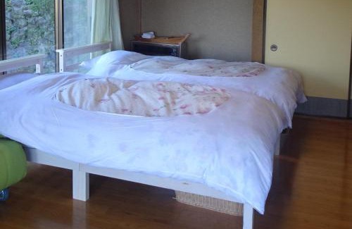 Kawana Apartment | 旅ポストのの花