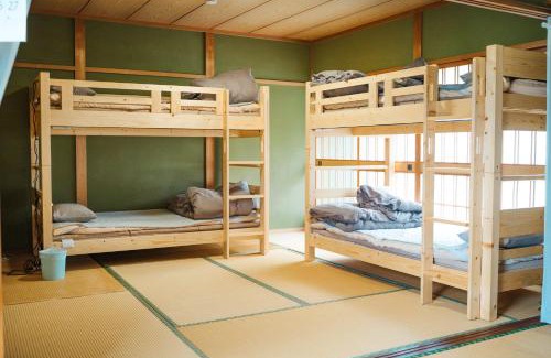 Hoshinooka House | 木の家ゲストハウス松山本館