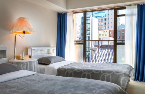 Tenjin Apartment | 桜音屋