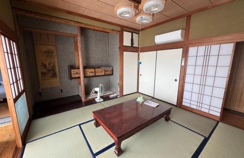 Otsuki Apartment | 海と西一棟貸し宿