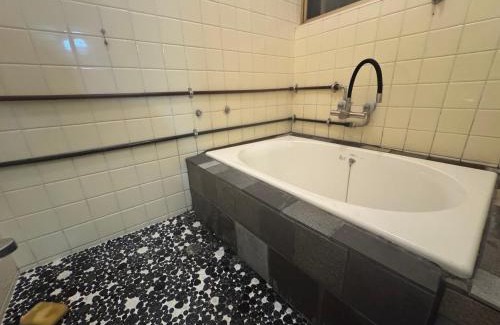 Otsuki Apartment | 海と西一棟貸し宿