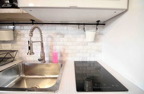 Mayaguez Pueblo Apartment | 1.6 Modern Farmhouse with Generator Balcony