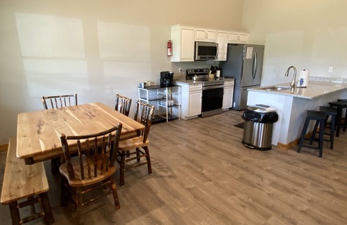 McHenry House | #1 Cabin~Walk to WISP! Lake access & dock! HOT Tub~Game room~Fire Pit & DOGS OK!