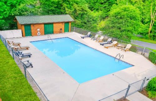Pigeon Forge House | 1 mile from Parkway, Game, Fire Pit, Hot Tub, Shared Pool, Pets Welcome!