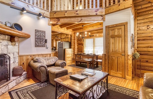 Pigeon Forge House | 1 mile from Pigeon Forge log cabin Townhouse has hot tub with indoor and outdoor pool sleep 8