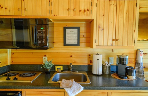 Paxinos Cottage | 1 Queen size bed &Love seat sofa, Creek view