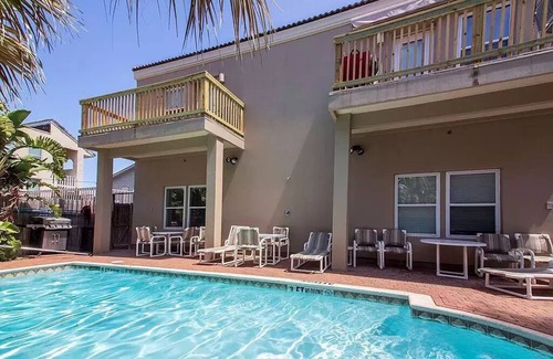 South Padre Island Condo | 10% July Discounts! 125 Steps to Beach! Ground Floor. Hot Tub and Heated Pool!