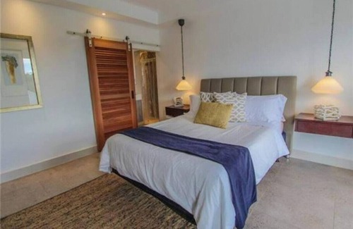 Islote House | 103 King Pool View Suite at The Grand Villa