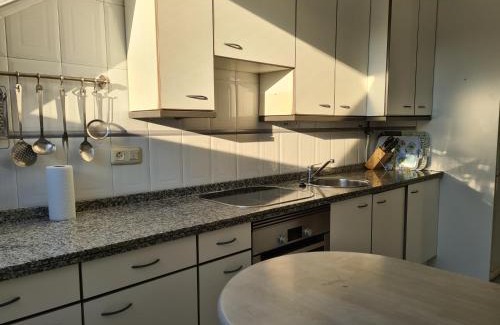 Distrito Oeste Apartment | 106A Ático con garaje y chimenea cerca de la playa