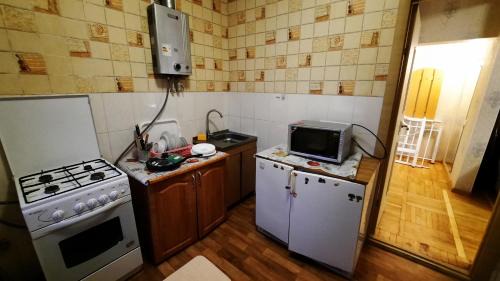 Sukhinovka Apartment | 2 кімнатна Квартира подобово у центрі Полтави біля ЦУМу з власною закритою парковкою Документи для відрядження Мережа квартир