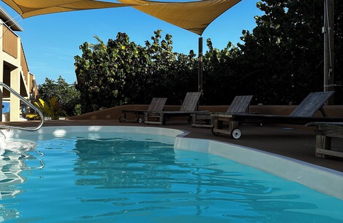 West End House | 2-bd sandy beachfront apt w/pool, cabana, hammocks, sunsets! a tropical dream!