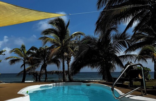 West End House | 2-bd sandy beachfront apt w/pool, cabana, hammocks, sunsets! a tropical dream!