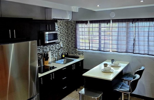 Sabana Abajo Condo | 2-bedroom condo in charming Carolina with WiFi, AC. 4 min walk to beach!