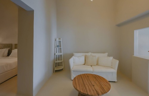 Megalochori House | 2 bedroom Family Cave Suite, terrace & kitchen, by Elements Suites