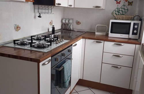 Riva del Garda Apartment | 2 min from the historic center. Small apartment in quiet area with balcony.