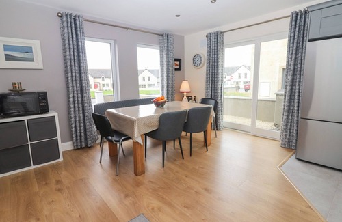Fenit Cottage | 20 LIGHTHOUSE VILLAGE, family friendly in Fenit, County Kerry
