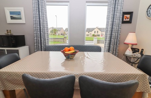 Fenit Cottage | 20 LIGHTHOUSE VILLAGE, family friendly in Fenit, County Kerry