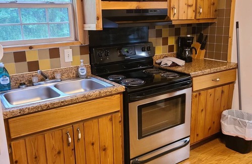 Slidell Cabin | 2BR 1BA Cabin w/4 Bunk Beds & Queen