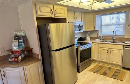 Avon By The Sea Condo | 2BR Beachfront Condo with Pool BBQ & Steps To Pier!