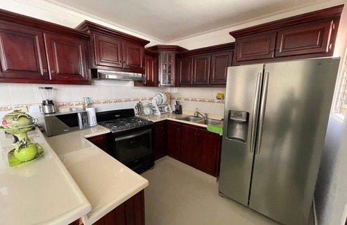 Gregorio Luperon House | 3 bedroom furnished apartment with pool gym parking 24 hours security