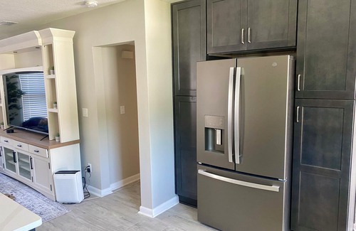 Arlington House | 3-bedroom house in Jacksonville with fenced backyard and screen enclosed pool.