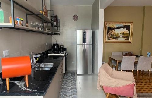 Gonzaga Apartment | 350 metros da praia Gonzaga local turístico