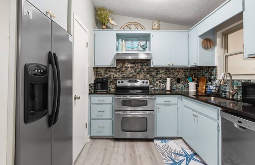 Biltmore Beach House | 3B/2B house with POOL. 700' to public boat ramp & .6 mi to beach access!