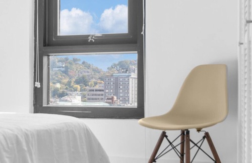 Five Points South Apartment | 3BR Oasis with Skyline Views 12th Floor