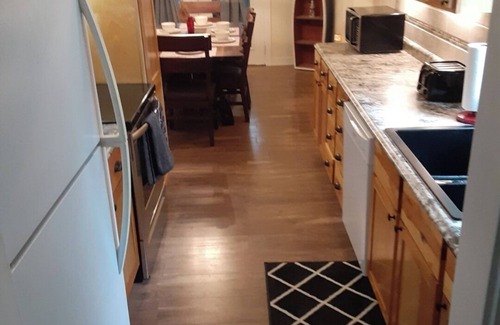 Tawas City House | 4-bedroom home in Tawas City with indoor pool and game room across from L Huron
