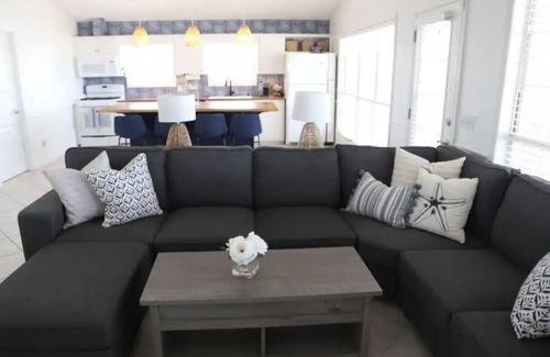 Riviera Beach House | 4-bedroom house, Heated Pool, Hot Tub, 6 person Golf Cart. 2 blocks from beach.