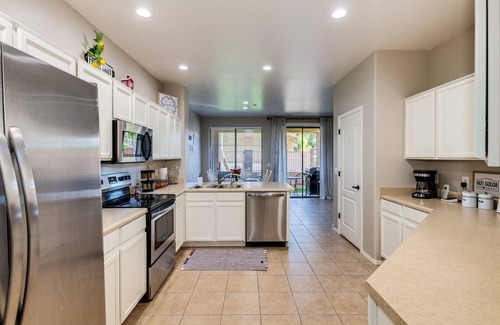 Sunrise Village House | 4 homes next to each other in Golf Course Gated Community for Large Groups!