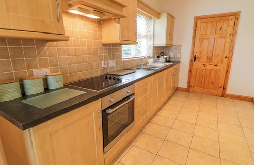 Culdaff Cottage | 46 DUNALINN, pet friendly, with open fire in Culdaff, County Donegal
