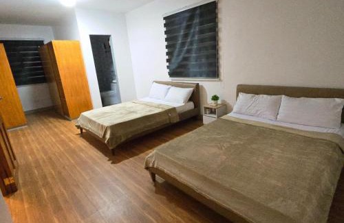 Malabag House | 4BR Villa with Private Pool & Roof deck