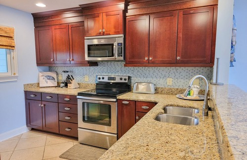 Arcadian Shores Condo | 4e Windermere By The Sea 4 Bedroom Villa