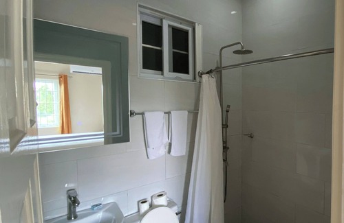 Saint Andrew Apartment | 5 minutes away fom PriceSmart! Pet-Friendly Cozy Studio with warm water