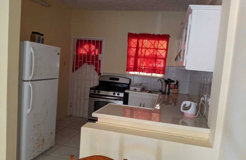 Kingstown Apartment | 5 minutes walk to the capitol, Kingstown. Gym is one minute walk away.