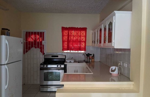 Kingstown Apartment | 5 minutes walk to the capitol, Kingstown. Gym is one minute walk away.