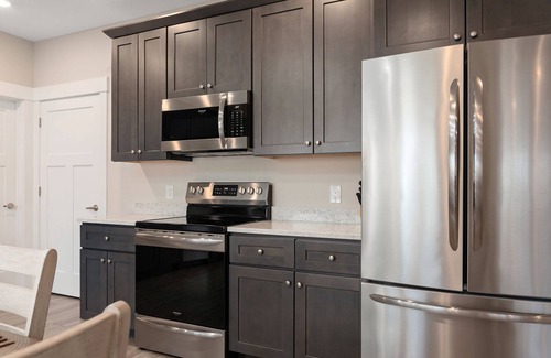 Traverse City Condo | ♛ 539 Bay St ⁀➷ Luxury Downtown 2BDR Lake View Penthouse Condo steps to Beach!