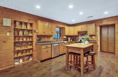 Tomball Cottage | 8 acres of fun & relaxation in a beautiful Rock Cottage with a pool and hot tub