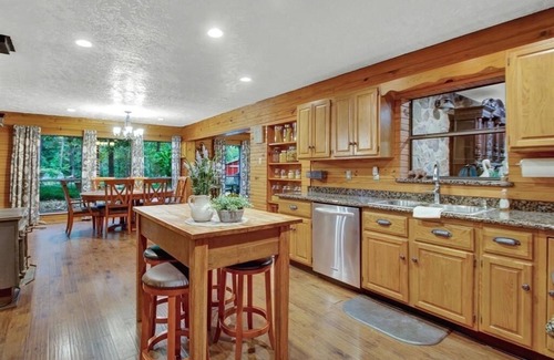 Tomball Cottage | 8 acres of fun & relaxation in a beautiful Rock Cottage with a pool and hot tub