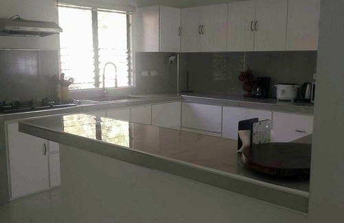 Abra de Ilog House | A 3 floor contemporary styled beach house. Steps away from fine white sands!