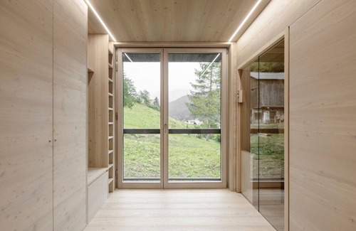 Santo Stefano di Cadore Ski Chalet | A beautiful wood and glass chalet at the edge of the Forest