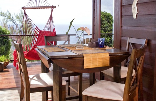 Ragged Point House | A beautiful wooden house built among the trees with views of the Atlantic coast