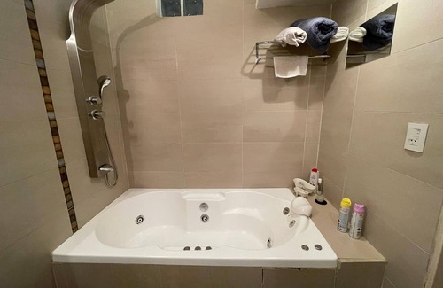 Cordoba House | A bedroom and a bathroom