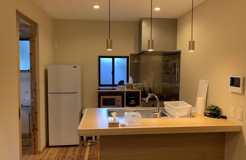 Genka House | A house in the forest, with a large garden for barbecue and a nearby river to play as much as you like.